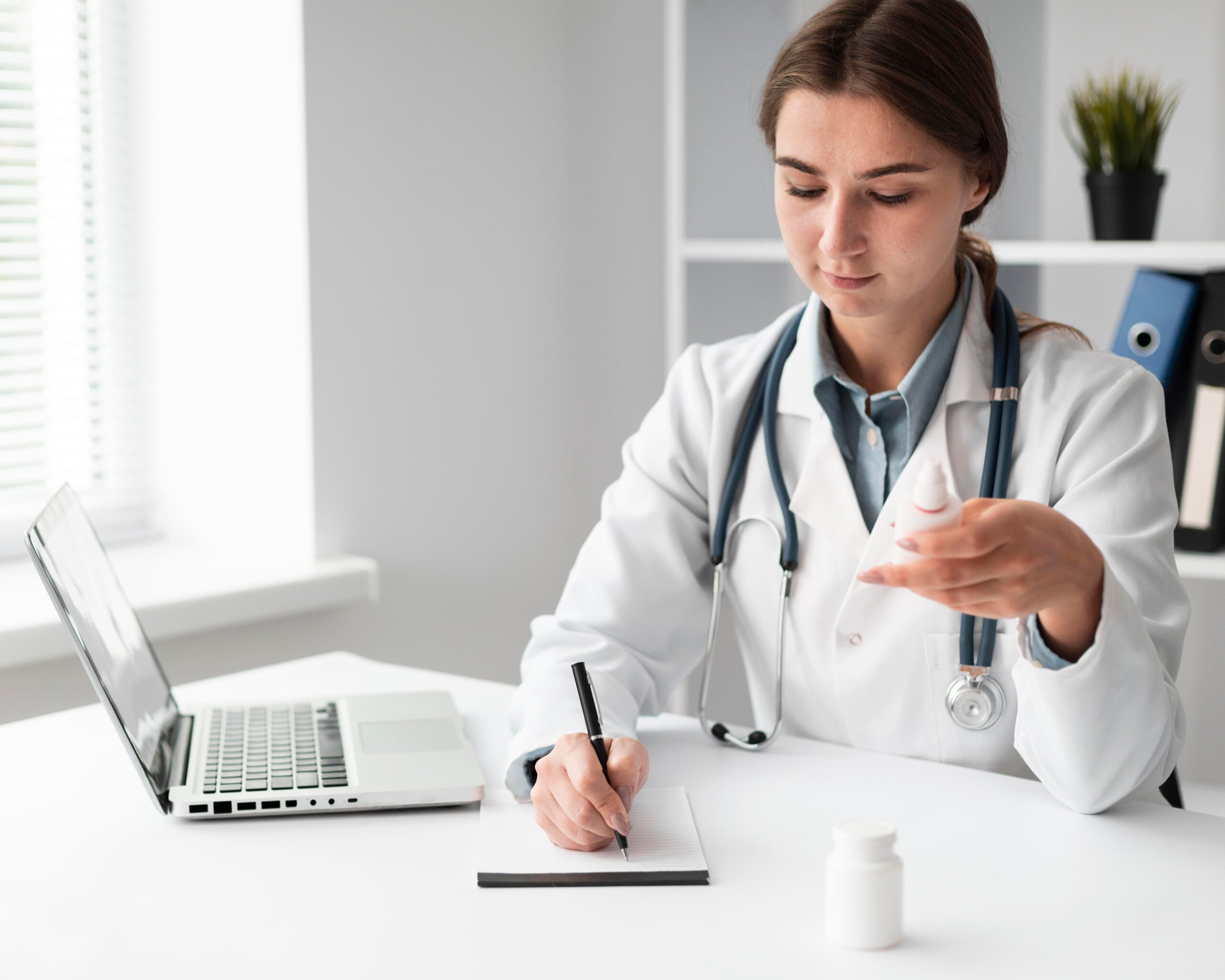 jpeg optimizer doctor writing medical prescription